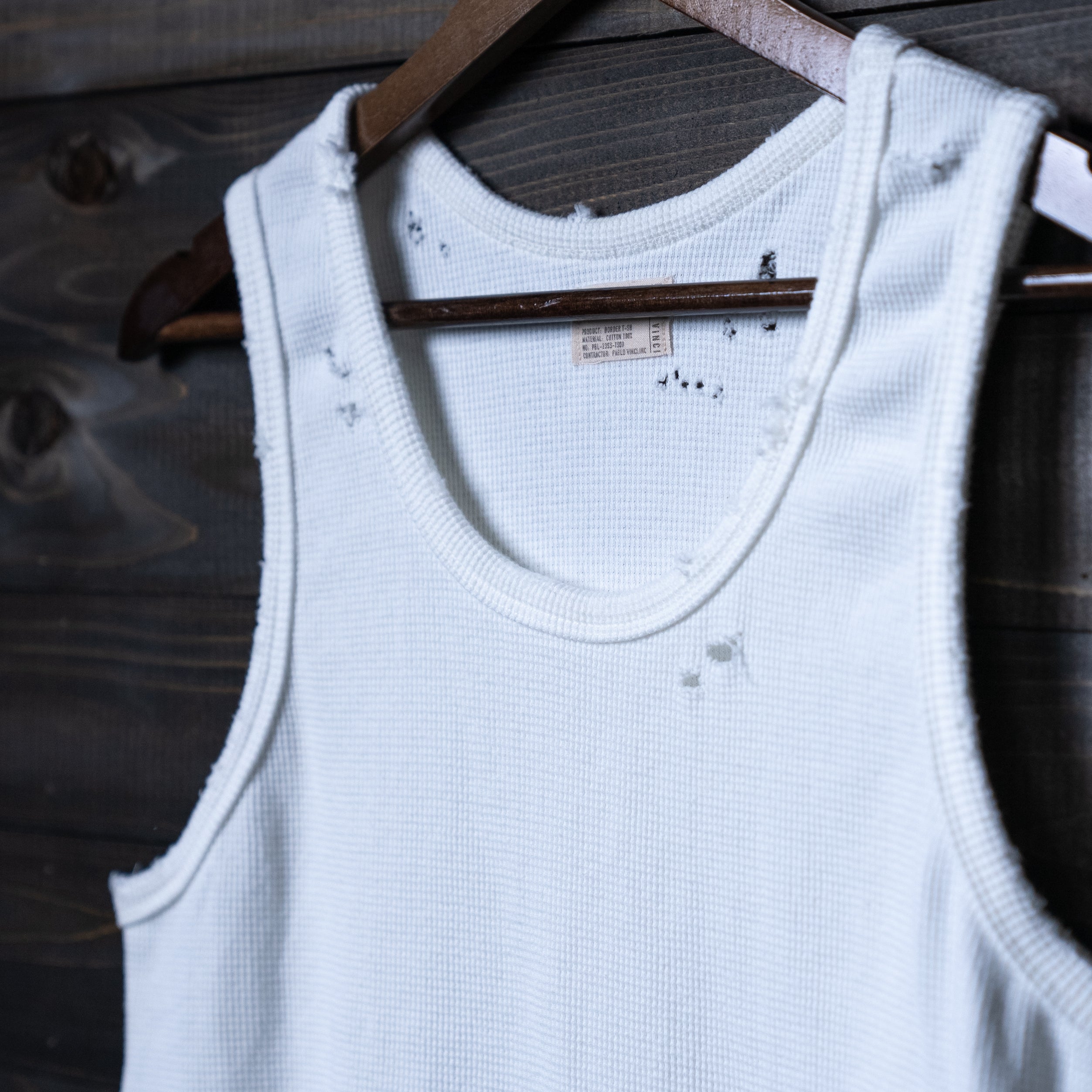 Damage tank top